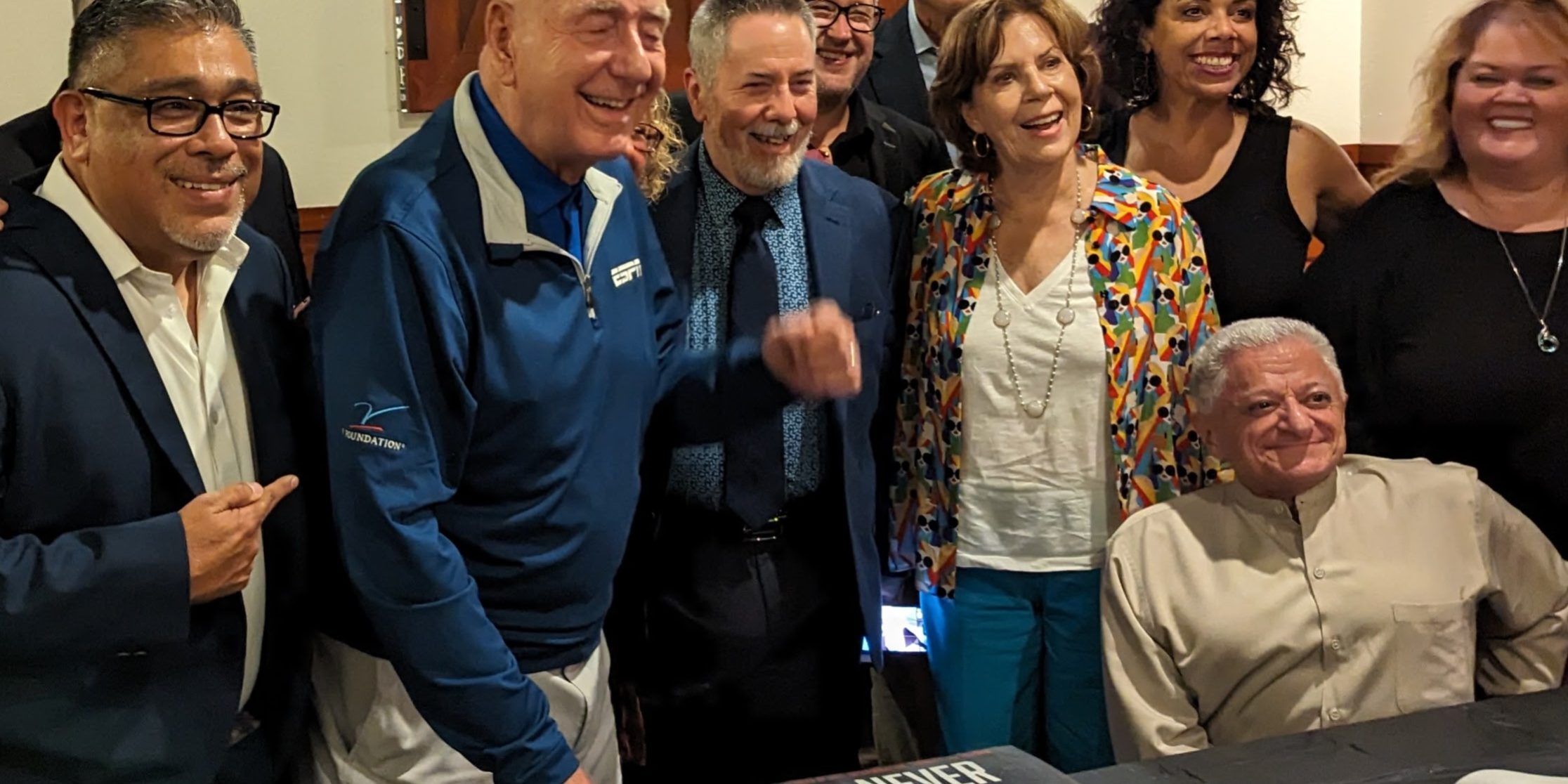 Dick Vitale and Carlos Samanigo celebrating book launch