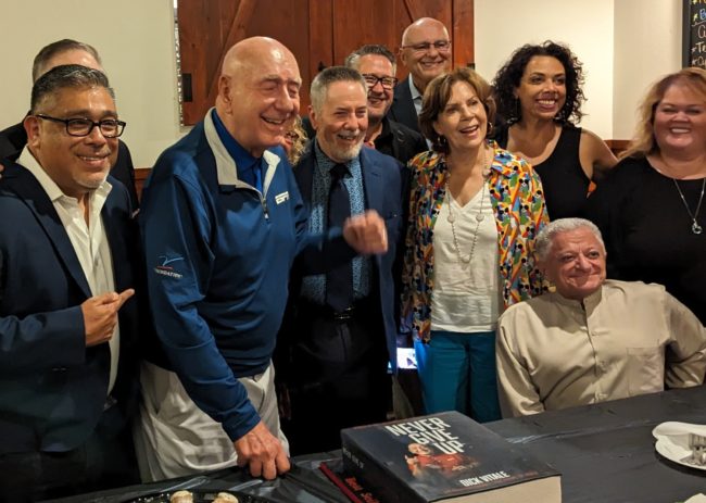 Dick Vitale and Carlos Samanigo celebrating book launch